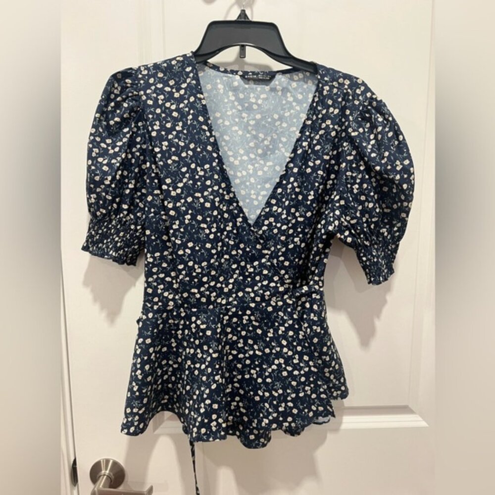 Floral peplum wrap shirt